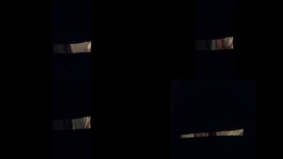 Window voyeur through a small gap